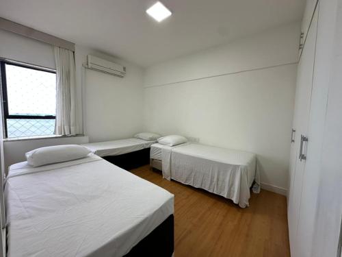 Ένα ή περισσότερα κρεβάτια σε δωμάτιο στο Recife Flat Service Boa Viagem - 6 pessoas