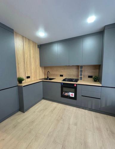 Η κουζίνα ή μικρή κουζίνα στο Apartment Modern Chișinău