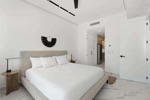 Voodi või voodid majutusasutuse Encantame Soleil New Resort 3rd Floor Studio toas