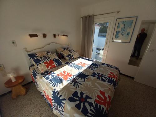 Postel nebo postele na pokoji v ubytování Carpe Diem Port de la Selva