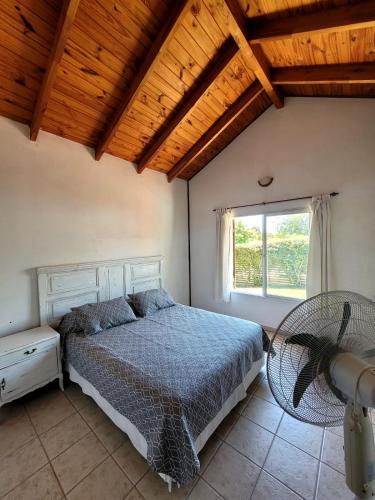 Postel nebo postele na pokoji v ubytování Margaritas House