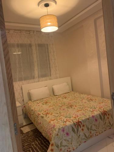 Postel nebo postele na pokoji v ubytování Bel appart proche de la plage