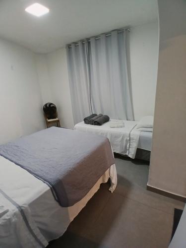 Cama o camas de una habitación en Apartamento á 1200m da Praia de Itapua