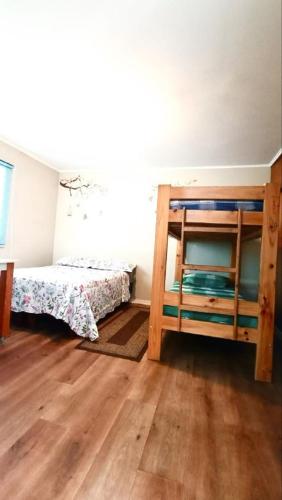 Postel nebo postele na pokoji v ubytování Alojamiento familiar Ñuñoa con estacionamiento a pasos del Estadio Nacional e ISP