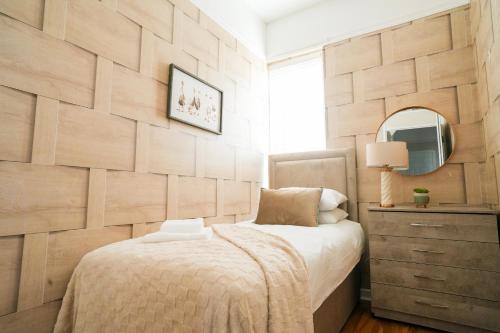 Ένα ή περισσότερα κρεβάτια σε δωμάτιο στο Alexandra House