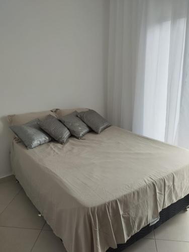 Ένα ή περισσότερα κρεβάτια σε δωμάτιο στο Sobrado Harmonia