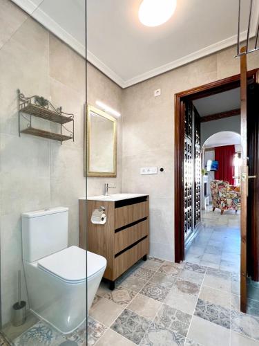 a bathroom with a toilet and a sink at Marisol Apartment Vera Playa Andalusia 150 m from the Beach, Spain in Vera