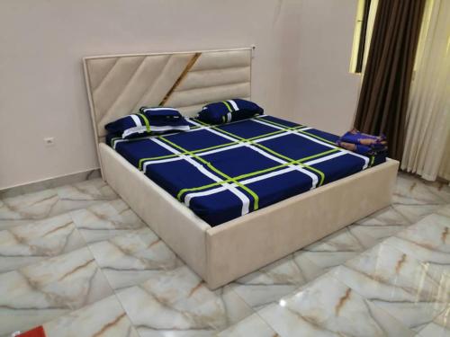 Una cama o camas en una habitación de Appartement Arconville