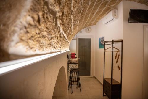 TV a/nebo společenská místnost v ubytování Archi di Puglia