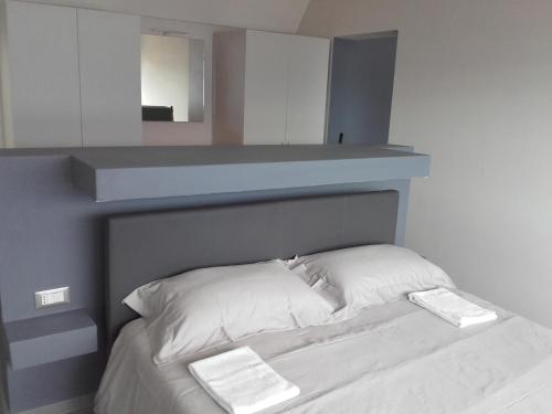 Postel nebo postele na pokoji v ubytování Appartamento Wow