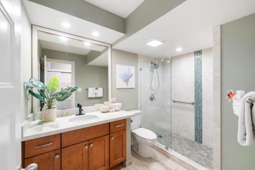 a bathroom with a sink and a shower at Lahaina Shores 426 in Wainee