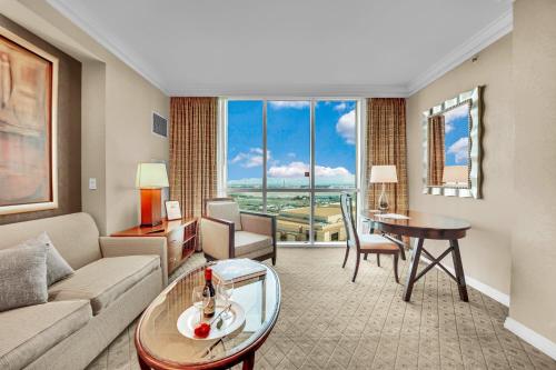 a living room with a couch and a table at Solara Vita at MGM Signature in Las Vegas