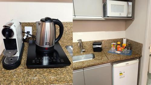 Kuchyň nebo kuchyňský kout v ubytování Hotel Aeroporto Stay Here