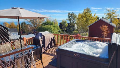 Φωτογραφία από το άλμπουμ του L'Ancestrale spa, vue, salle d'arcades σε La Malbaie