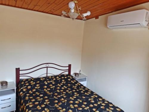 Ένα ή περισσότερα κρεβάτια σε δωμάτιο στο Hospedaje ES ACA