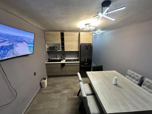 Kuchyň nebo kuchyňský kout v ubytování Depa nuevo y equipado en Saltillo 2 recámaras