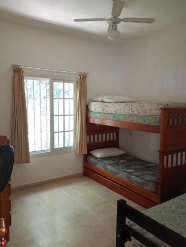 Postel nebo postele na pokoji v ubytování Casa Narnia