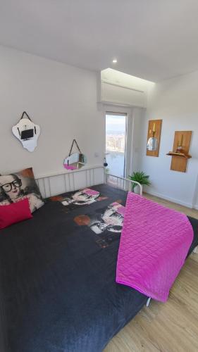 Ένα ή περισσότερα κρεβάτια σε δωμάτιο στο Apartamento Praia