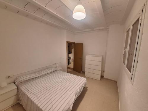 Postel nebo postele na pokoji v ubytování Casa Rural, masia antiga en rehabilitació, Mas Graells