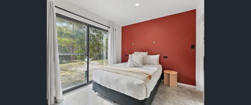 Postel nebo postele na pokoji v ubytování Glen Of Dreams' - Four Mile Creek