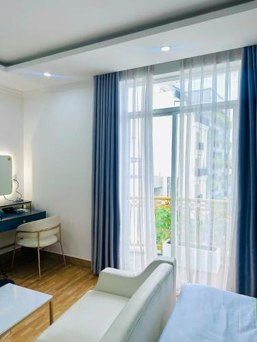 Postel nebo postele na pokoji v ubytování SANG VILLA Đà Nẵng