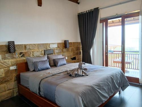 Ένα ή περισσότερα κρεβάτια σε δωμάτιο στο Lafrin Brothers