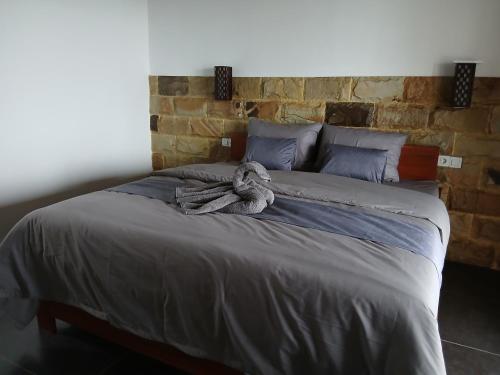 Ένα ή περισσότερα κρεβάτια σε δωμάτιο στο Lafrin Brothers