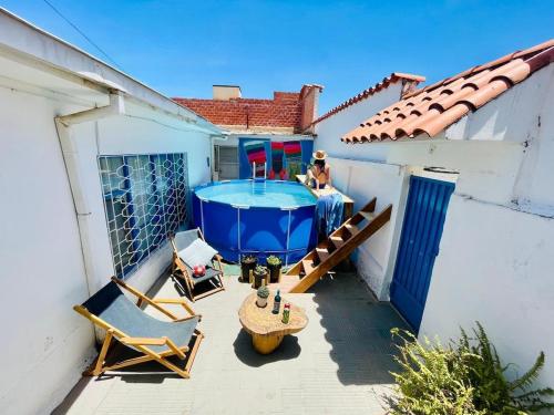 Casa céntrica con patio, piscina privada y 6 habitaciones