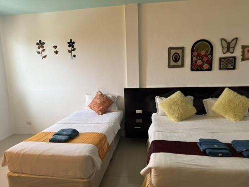 Postel nebo postele na pokoji v ubytování 太阳花酒店亲子套房