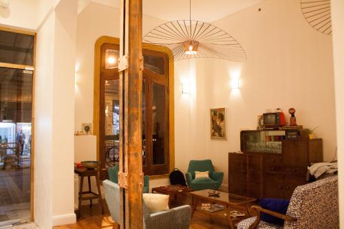 Posezení v ubytování L'Adresse Hôtel Boutique