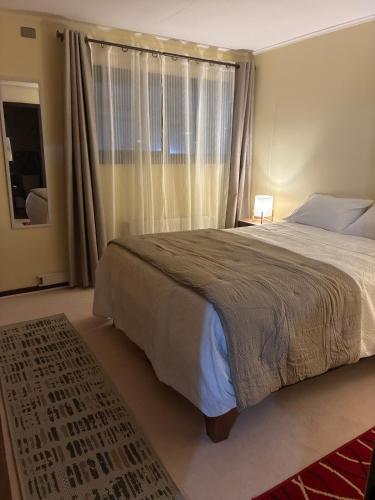 Ένα ή περισσότερα κρεβάτια σε δωμάτιο στο Hostal Mundet