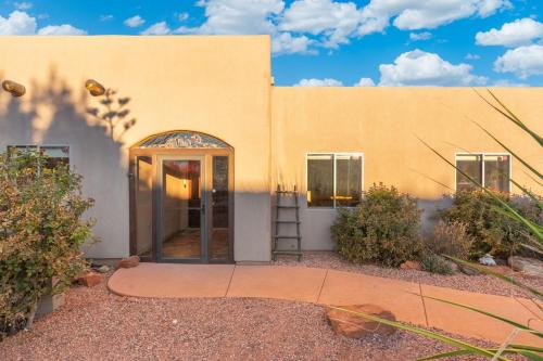 a building with a ladder in front of it at 3BD-2BA Heated Pool & Spa Fire-pit BBQ Billiards in Sedona