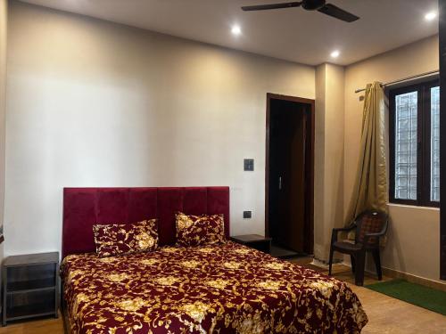 Ένα ή περισσότερα κρεβάτια σε δωμάτιο στο Kamlkash niwas homestay