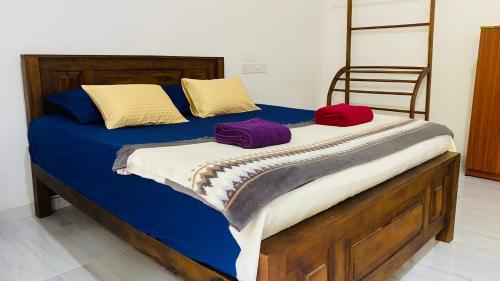 Elisha Place Hiriketiyaにあるベッド