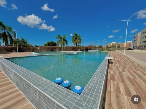 La alberca dentro o cerca de Apartamento com piscina e academia