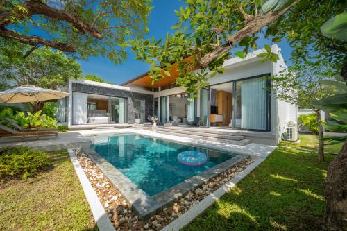 an image of a swimming pool in the backyard of a house at Villa Beautiful swimming pool in Phuket
