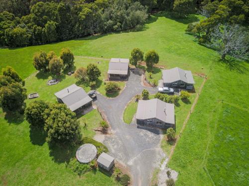 an aerial view of a house in a field at Rustic Hut Bush Retreat in Penguin