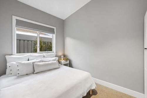 Ένα ή περισσότερα κρεβάτια σε δωμάτιο στο The Ausly