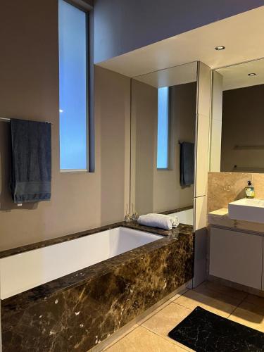 Koupelna v ubytování Nine O four