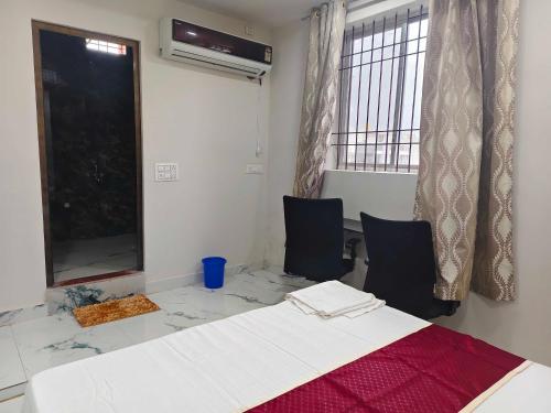 Ένα ή περισσότερα κρεβάτια σε δωμάτιο στο Hotel O Kant