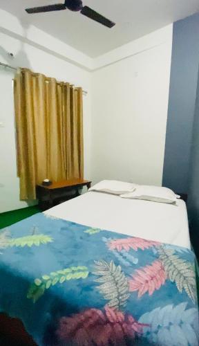 Llit o llits en una habitació de Hotel Bajhang