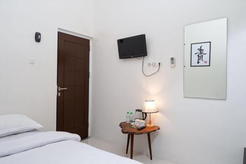 Postel nebo postele na pokoji v ubytování Padekostay