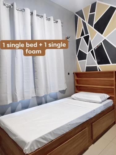 Ένα ή περισσότερα κρεβάτια σε δωμάτιο στο Bali Residences