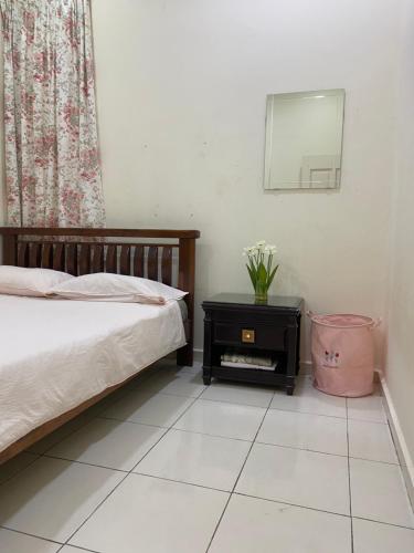 Ένα ή περισσότερα κρεβάτια σε δωμάτιο στο Magnolia homestay 2