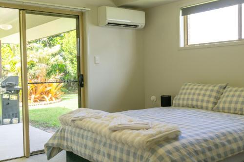 Ένα ή περισσότερα κρεβάτια σε δωμάτιο στο Welcome to Tinnie Retreat