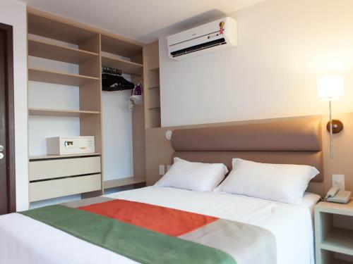 Postel nebo postele na pokoji v ubytování Beach Class Residence Service