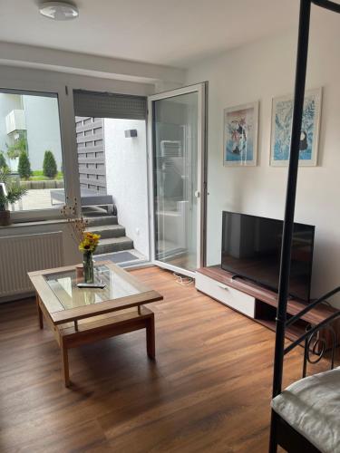 TV a/nebo společenská místnost v ubytování Domus Lux 53