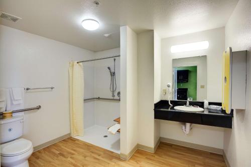 a bathroom with a sink and a toilet at Studio 6-Sweetwater, TX in Sweetwater