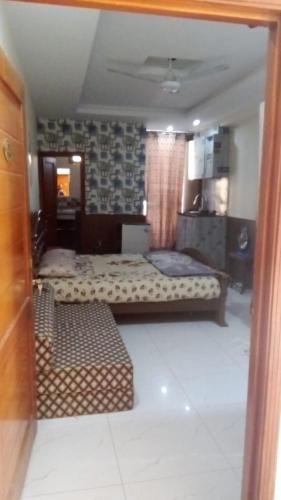 a bedroom with two beds in a room at Murree Oaks Tulip Block in Murree