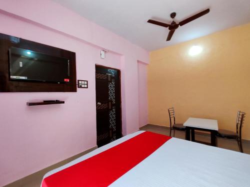 TV a/nebo společenská místnost v ubytování Hotel Pallavi Inn